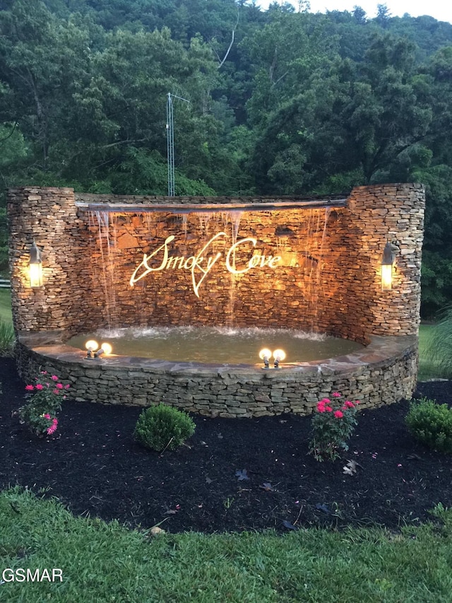 2017 Smoky Cove Rd, Sevierville, TN 37876 - community / neighborhood sign with a forest view