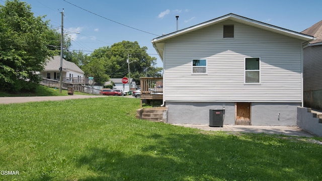 1625 Worth St, Knoxville, TN 37917 - view of side of home with a lawn and central air condition unit
