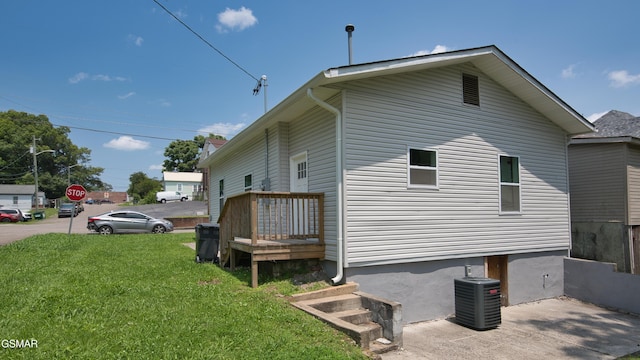 1625 Worth St, Knoxville, TN 37917 - view of property exterior featuring central AC and a lawn
