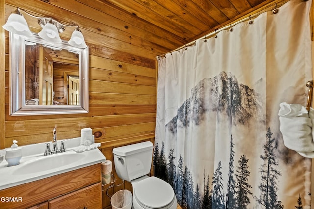 bathroom featuring wood walls, vanity, wood ceiling, and toilet