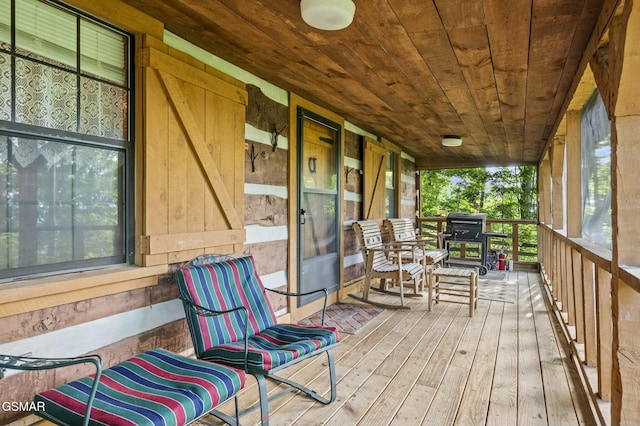 wooden deck with a porch