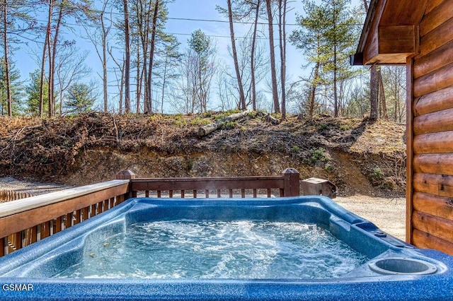 view of pool featuring a hot tub