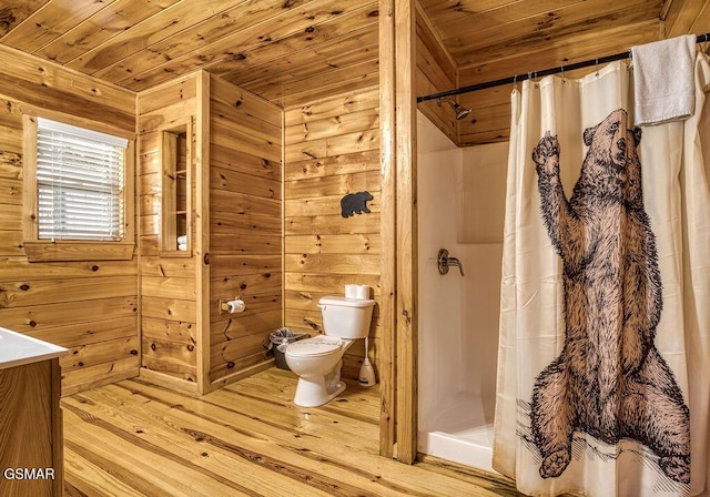 bathroom featuring wood walls, wooden ceiling, toilet, and a shower stall