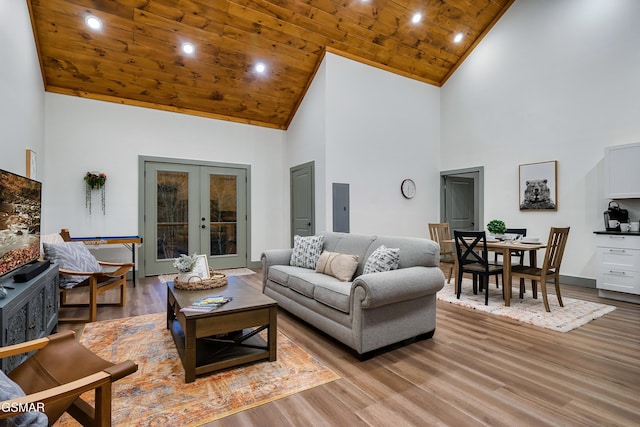 1719 Walker Trl, Sevierville, TN 37876 - living room with high vaulted ceiling, wood ceiling, french doors, electric panel, and wood finished floors