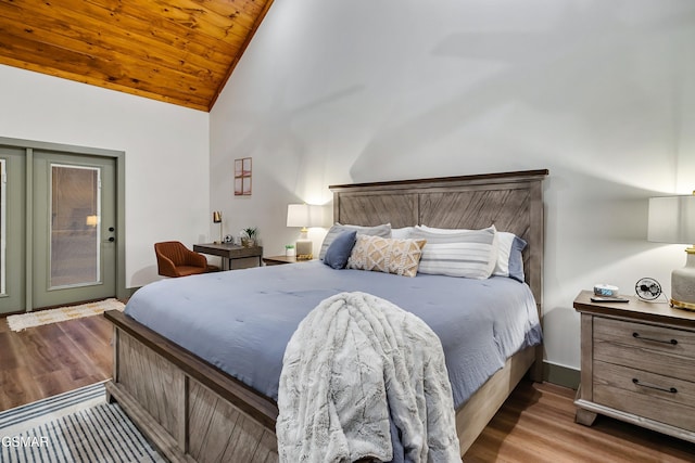 1719 Walker Trl, Sevierville, TN 37876 - bedroom with wood finished floors, wood ceiling, and high vaulted ceiling