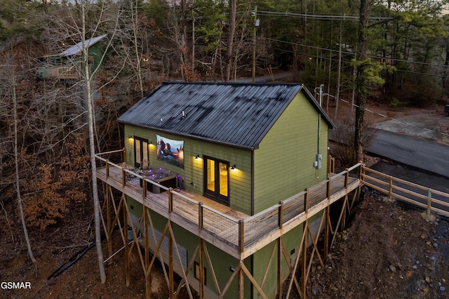 1719 Walker Trl, Sevierville, TN 37876 - back of house featuring metal roof and a deck