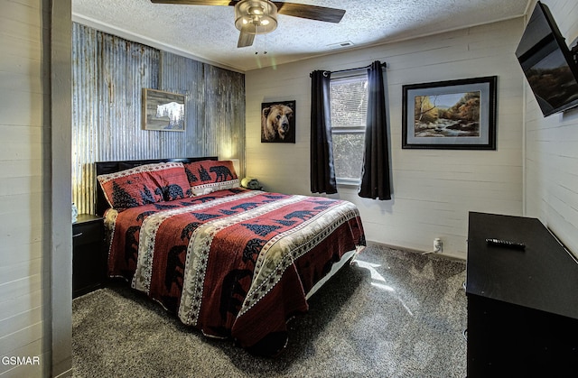 2589 Ridge Rd, Pigeon Forge, TN 37863 - carpeted bedroom with wooden walls, a textured ceiling, and a ceiling fan