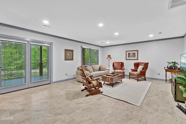 living room with ornamental molding