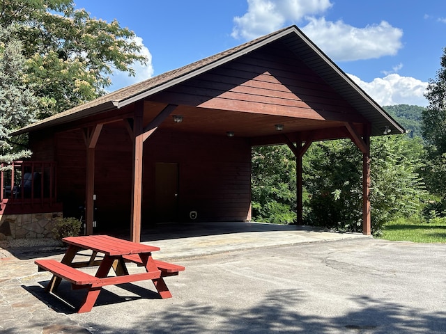 exterior space with a carport