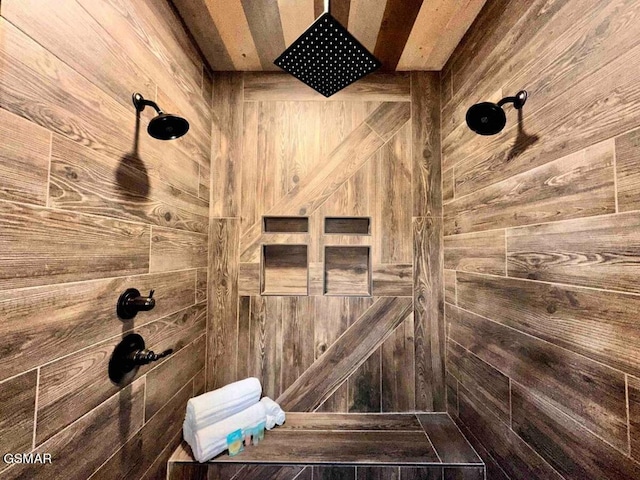 bathroom with tiled shower