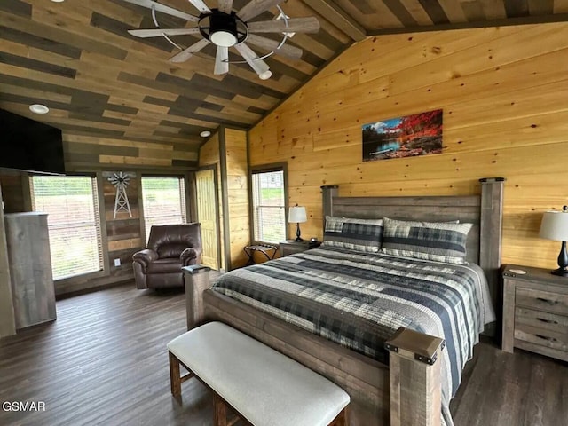 bedroom featuring wooden walls, high vaulted ceiling, and wood finished floors