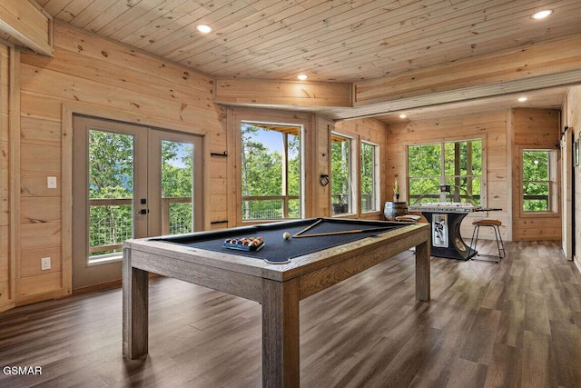 game room with wooden ceiling, wood finished floors, french doors, wood walls, and recessed lighting