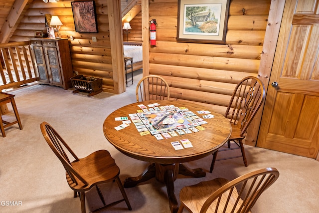 dining space with carpet flooring