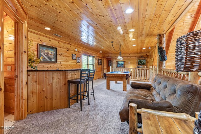 game room with light colored carpet, wood ceiling, wooden walls, and billiards