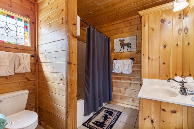 full bathroom featuring tile patterned flooring, shower / bath combination with curtain, wooden walls, and wood ceiling