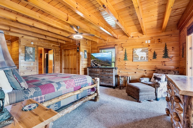 bedroom featuring carpet, wooden ceiling, wooden walls, ceiling fan, and beam ceiling