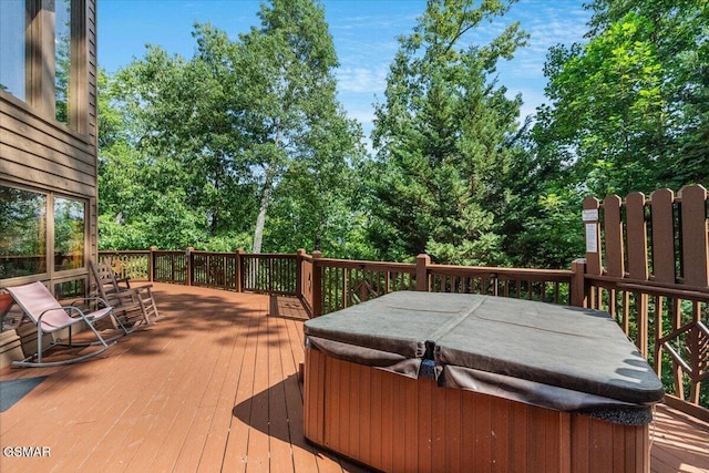 deck with a hot tub