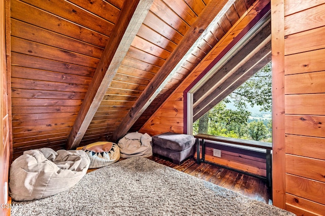 bonus room with vaulted ceiling with beams, dark wood-type flooring, wood walls, and wood ceiling