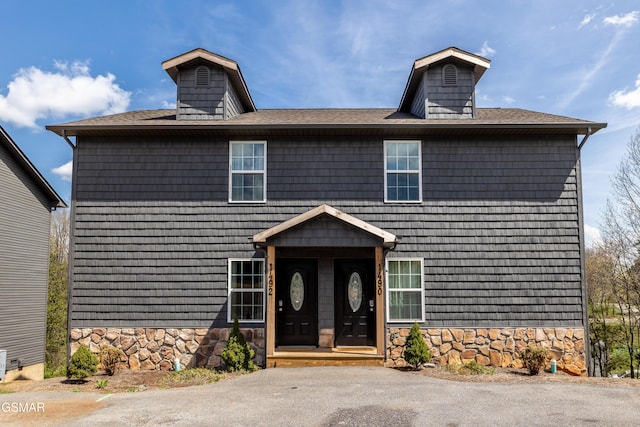 view of front facade featuring stone siding