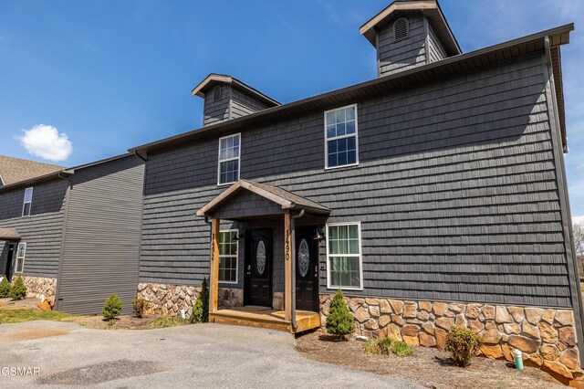 view of front facade with stone siding