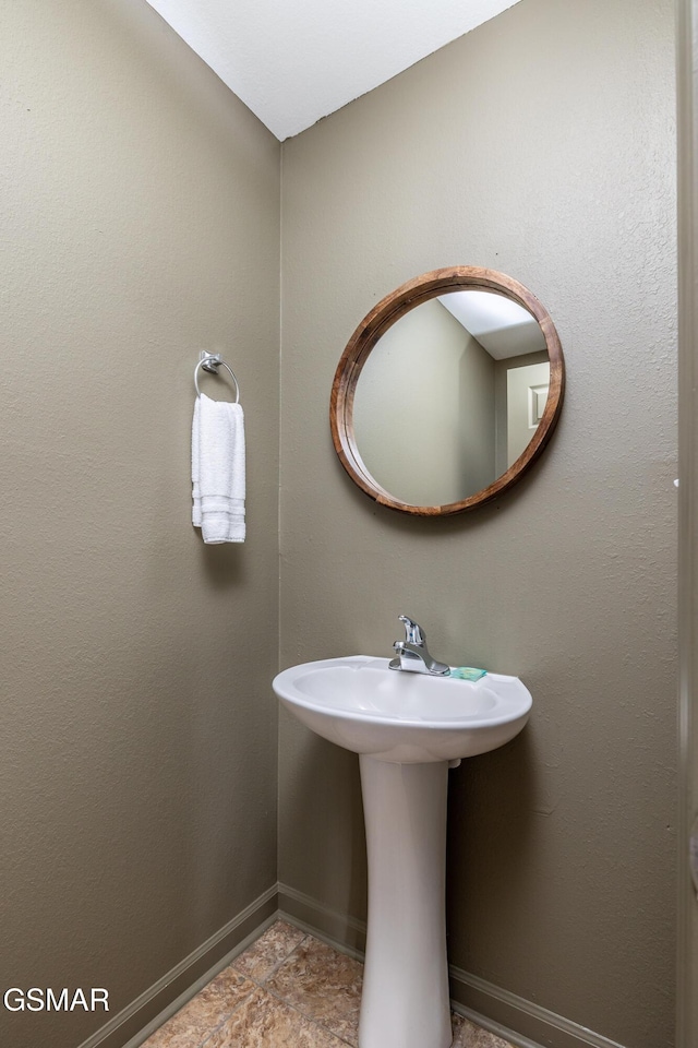 bathroom with baseboards