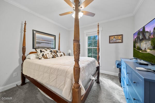 carpeted bedroom with baseboards, ornamental molding, and ceiling fan