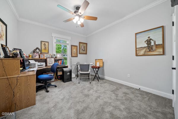 office with baseboards, ornamental molding, a ceiling fan, and carpet flooring