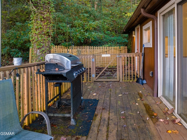 deck featuring a grill