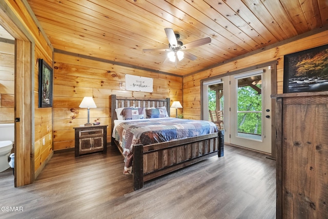 bedroom with wood walls, wood finished floors, wood ceiling, and access to exterior