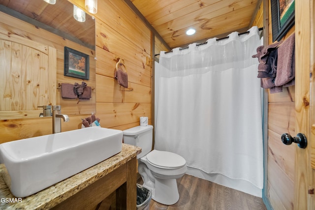 full bath featuring toilet, wood walls, wood finished floors, wooden ceiling, and a shower with shower curtain