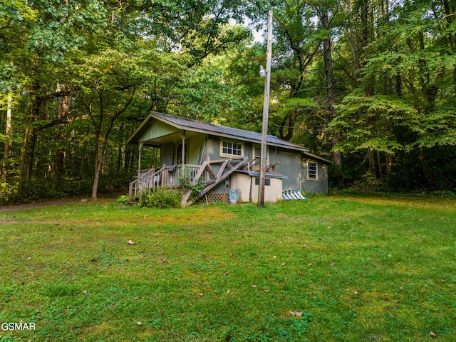 view of front of home with a front yard