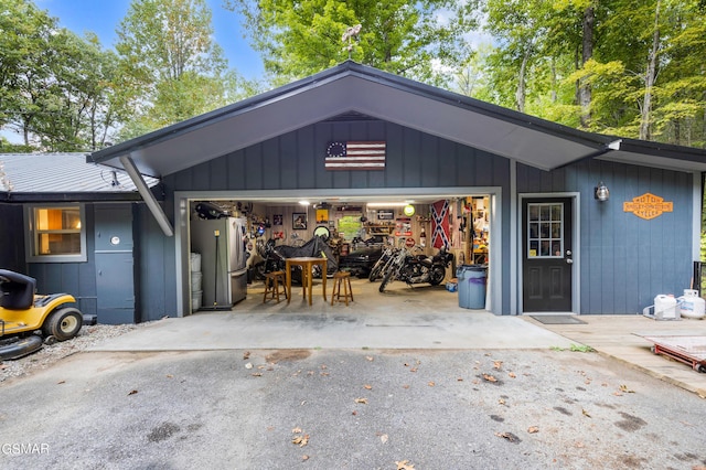 garage featuring stainless steel fridge