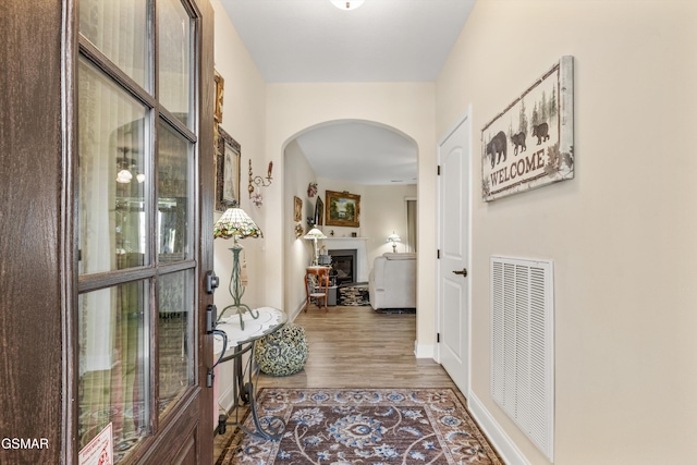 2159 Frewin Ct, Sevierville, TN 37876 - corridor featuring arched walkways and wood finished floors