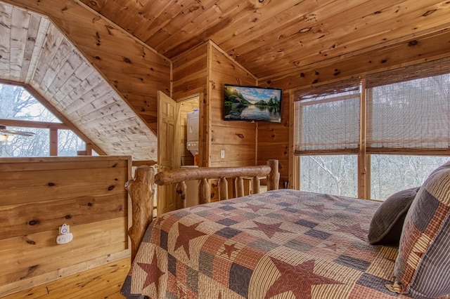 bedroom with wood walls, wood ceiling, and lofted ceiling