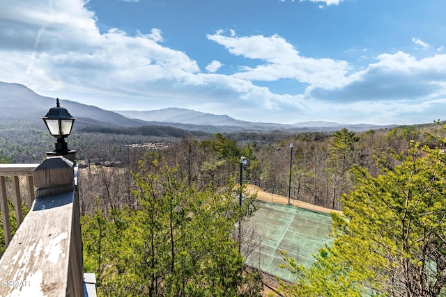 property view of mountains featuring a wooded view