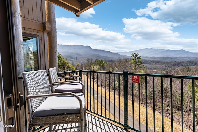 balcony featuring a mountain view