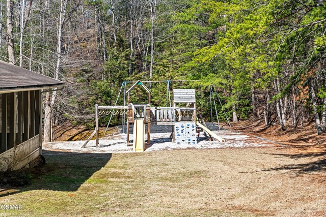 view of yard featuring playground community