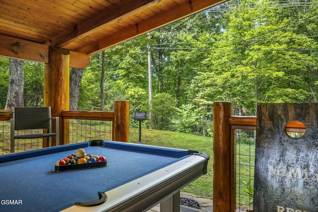 game room with wooden ceiling, beamed ceiling, and billiards