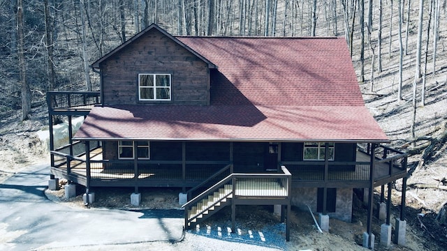 view of front of home featuring a wooden deck