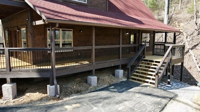 view of side of home featuring a deck