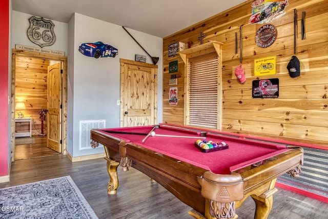 recreation room featuring wood walls, dark wood-type flooring, and billiards