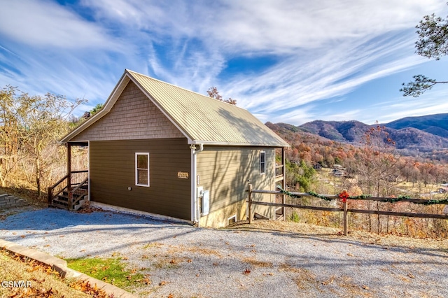 view of side of property featuring a mountain view