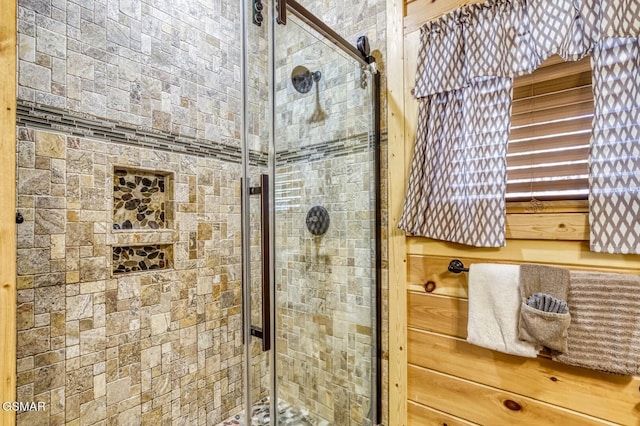 bathroom featuring an enclosed shower