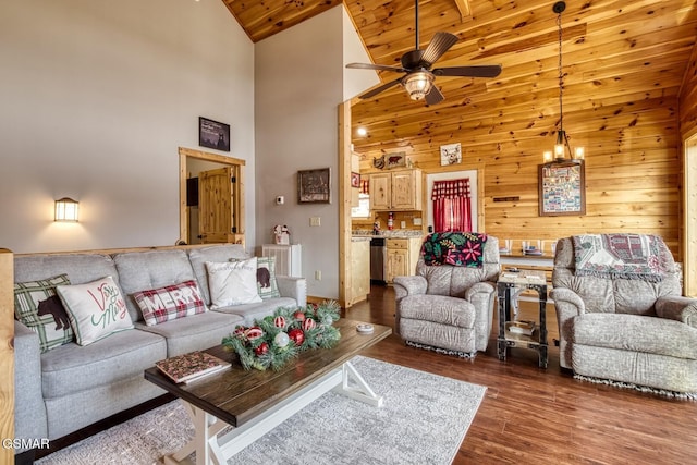 living room with wood ceiling, ceiling fan with notable chandelier, wooden walls, dark wood-type flooring, and high vaulted ceiling