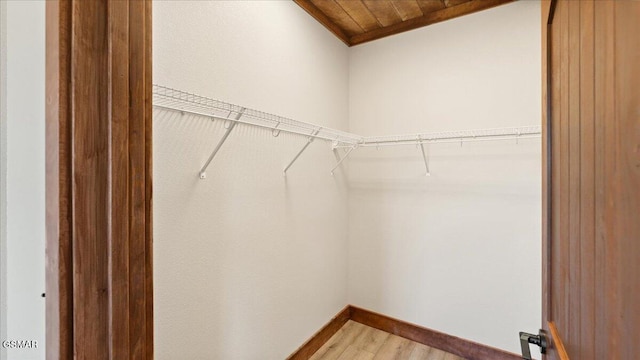 spacious closet with light wood-style flooring