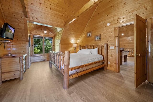 bedroom with beam ceiling, wooden walls, high vaulted ceiling, light hardwood / wood-style floors, and wooden ceiling