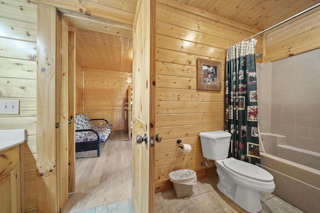 full bathroom with tile patterned flooring, shower / bathtub combination with curtain, wooden walls, and wood ceiling