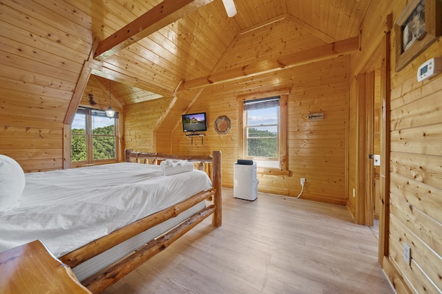 bedroom with wood ceiling, wooden walls, multiple windows, and vaulted ceiling with beams