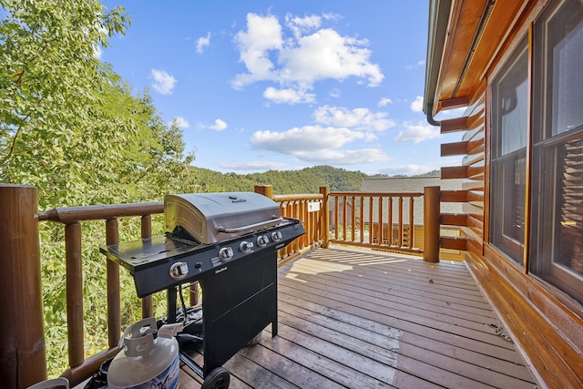 wooden terrace with grilling area