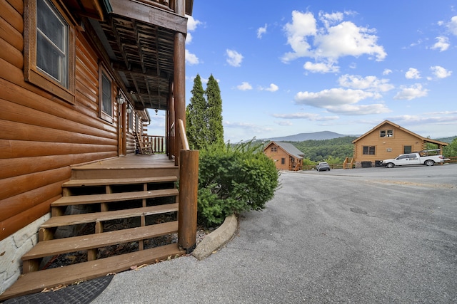 view of home's exterior with a mountain view